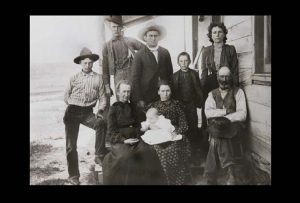 Evelyn Cameron. Family portrait of Hamlins and Braleys. Near Terry, Montana. 1902.